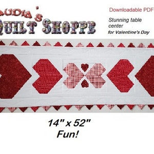 May include: A white table runner with a red and white checked heart design. The runner is 14 inches by 52 inches and is perfect for Valentine's Day.
