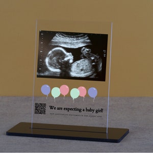 Display your pregnancy memories with a personalized ultrasound acrylic block with QR code.
