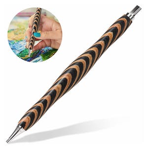 May include: A black and brown wooden diamond painting pen with a silver tip. The pen has a swirl pattern.