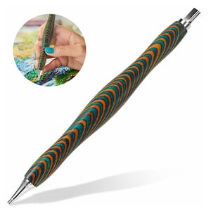 May include: A green, orange, and brown wooden diamond painting pen with a silver tip.