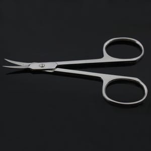 May include: A pair of stainless steel curved tweezers with a silver finish. The tweezers have a sharp point and are designed for precision work.