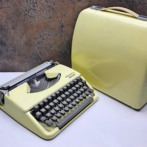 Vintage Beige Olympia Typewriter: Retro Manual Writing Tool, Working Condition