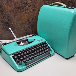 Olympia Splendid 33/66 Vintage Turquoise  Manual Typewriter with Black Keyboard - A Writing Tool for Journalists and Archivists - Gift