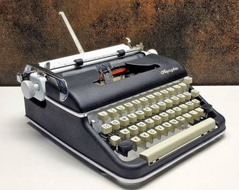 Vintage Olympia SM5 Black/White Typewriter - Working and Fully Restored - Ideal for Writers and Collectors