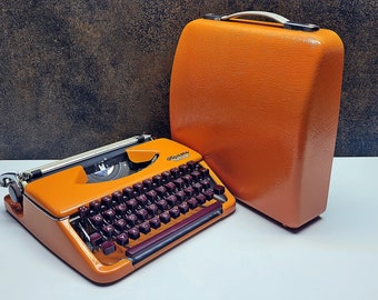 German-Made Olympia Splendid 33/66 Orange Typewriter with Mechanical Burgundy Keyboard and Case | Fully Refurbished Rare Writing Machine