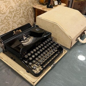 Restored Erika Typewriter: Vintage QWERTY Keyboard, Working Condition