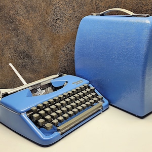 Vintage Olympia Splendid 33/66 Typewriter: Sky Blue Retro Writing Tool, QWERTY Conversion Option