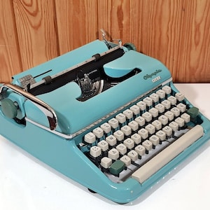 Olympia Monica 1960 Typewriter: Blue Vintage Collectible
