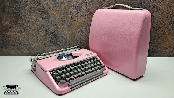 Olympia Splendid 33/66 Typewriter: Ice Pink Vintage German