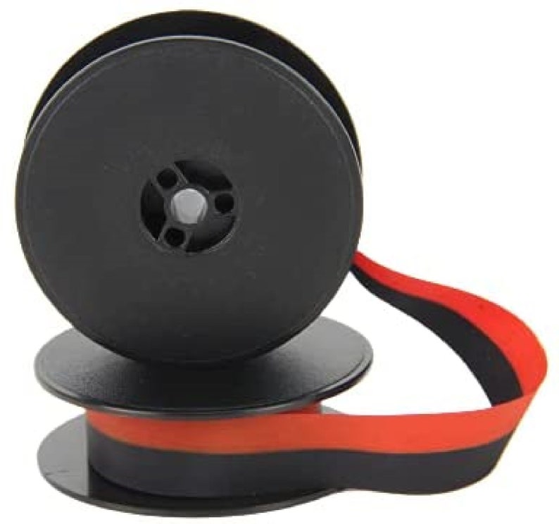May include: Black and red typewriter ribbon spool with a black plastic spool and a red and black ribbon.