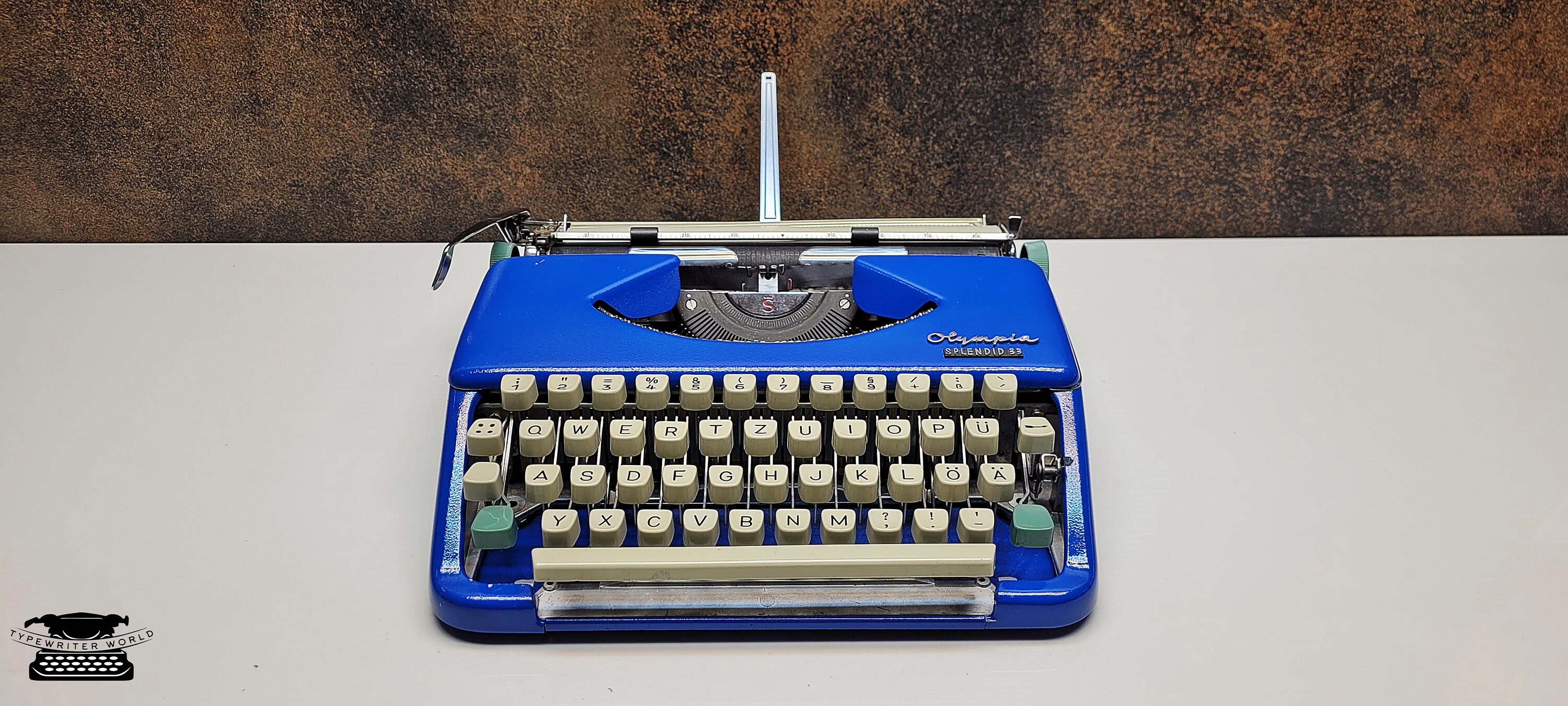 Olympia Splendid 33/66 Portable Typewriter in Blue With Matching