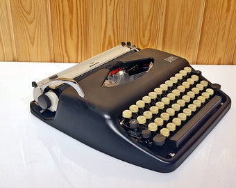 Adler Tippa タイプライター: 復元されたビンテージ手動筆記具、動作