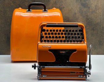 ヴィンテージ エルメス ベビー ポータブル タイプライター (良好な状態) ヴィンテージ エルメス ベビー オレンジ タイプライター
