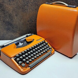 Vintage Olympia Splendid 33/66 Orange Typewriter - Retro Manual Writing Tool - Perfect for Collectors, Unique Valentines Day Gift