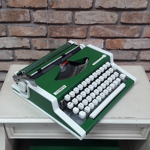 Green Olympia Traveller Deluxe Typewriter: 1970s Portable Manual Machine