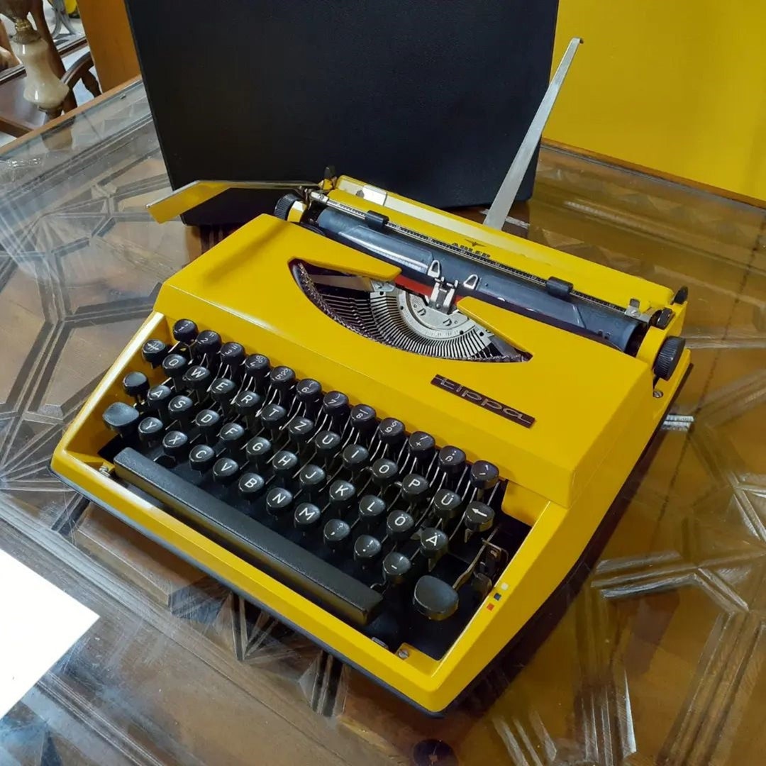 Adler Tippa Yellow Typewriter: Restored Vintage Collectible