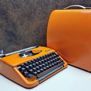Olympia Splendid 33/66 | Vintage Manual Typewriter | Orange Black | Retro German Model | Writers Gift | Elegant Desk Decor | 1960s