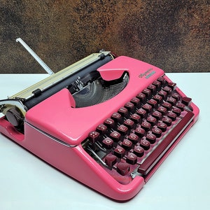 Antique Olympia Splendid 33/66 Pink Typewriter with Matching Case and Burgundy Keys | Rare Mechanical Keyboard for Writers and Collectors