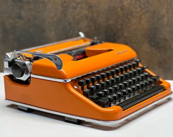 Máquina de escribir vintage Olympia SM3: máquina de escribir retro naranja portátil con bolsa, ¡máquina de escribir funcional / aduana pagada!
