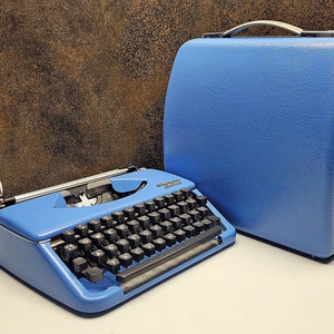 Vintage Olympia Splendid Typewriter: Blue Portable Manual Machine, Gift Ready