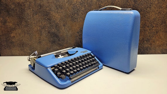 Vintage Olympia Splendid Typewriter: Blue Portable Manual Machine