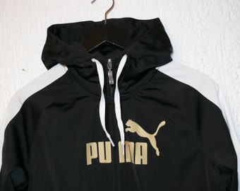 42eu PUMA TRACKING JACKET. Black ,white race strip down arm.Vintage T7 style