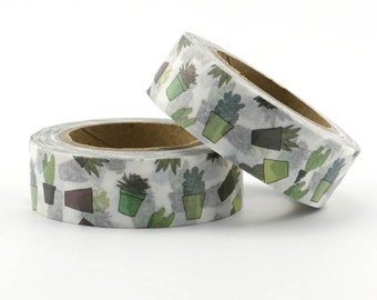 May include: Two rolls of washi tape with a white background and a repeating pattern of potted succulents in shades of green, brown, and gray.