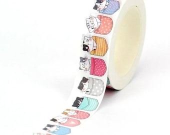 May include: A roll of white washi tape with a repeating pattern of cute cartoon cats peeking out of colorful pockets. The pockets have different patterns, including polka dots, stripes, and solid colors.