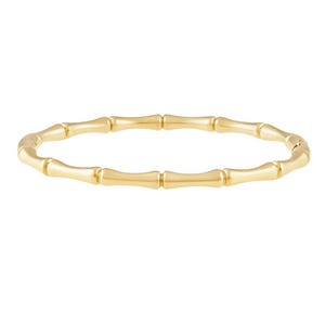 May include: A gold bangle bracelet made of linked, round, bamboo-shaped pieces.