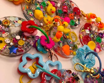 MYSTERY HAPPY PUDDLE. Happy puddle keyring. Happy puddle. Happy Puddle shape. Tactile Sensory shape. Comfort Tool. Pocket stim.