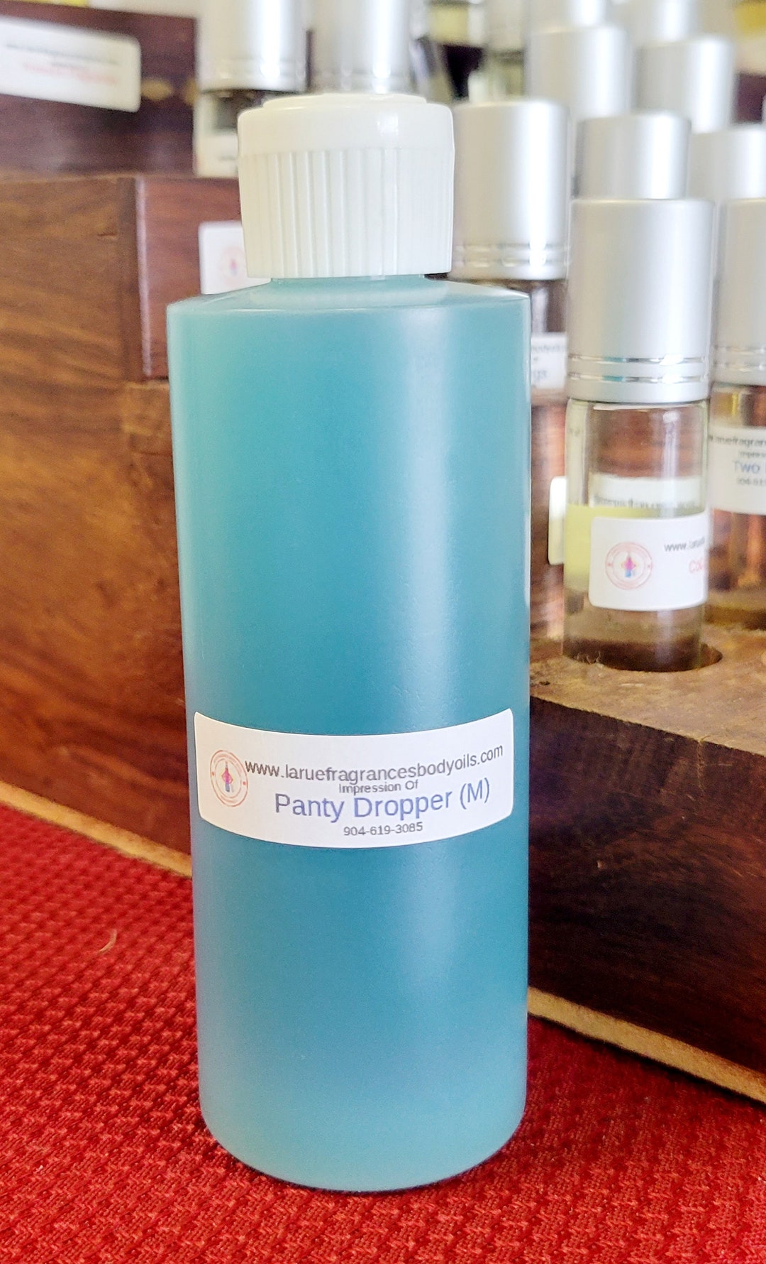 Compare Aroma to Panty Dropper Men 4oz Flip Top Bottle Cologne