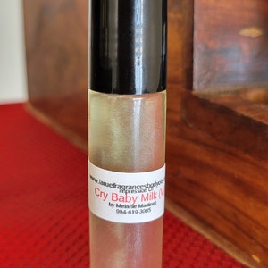 Compare aroma to Cry Baby Milk by Melanie Martinez women type 1/3oz roll-on bottle perfume fragrance body oil.Alcohol-Free
