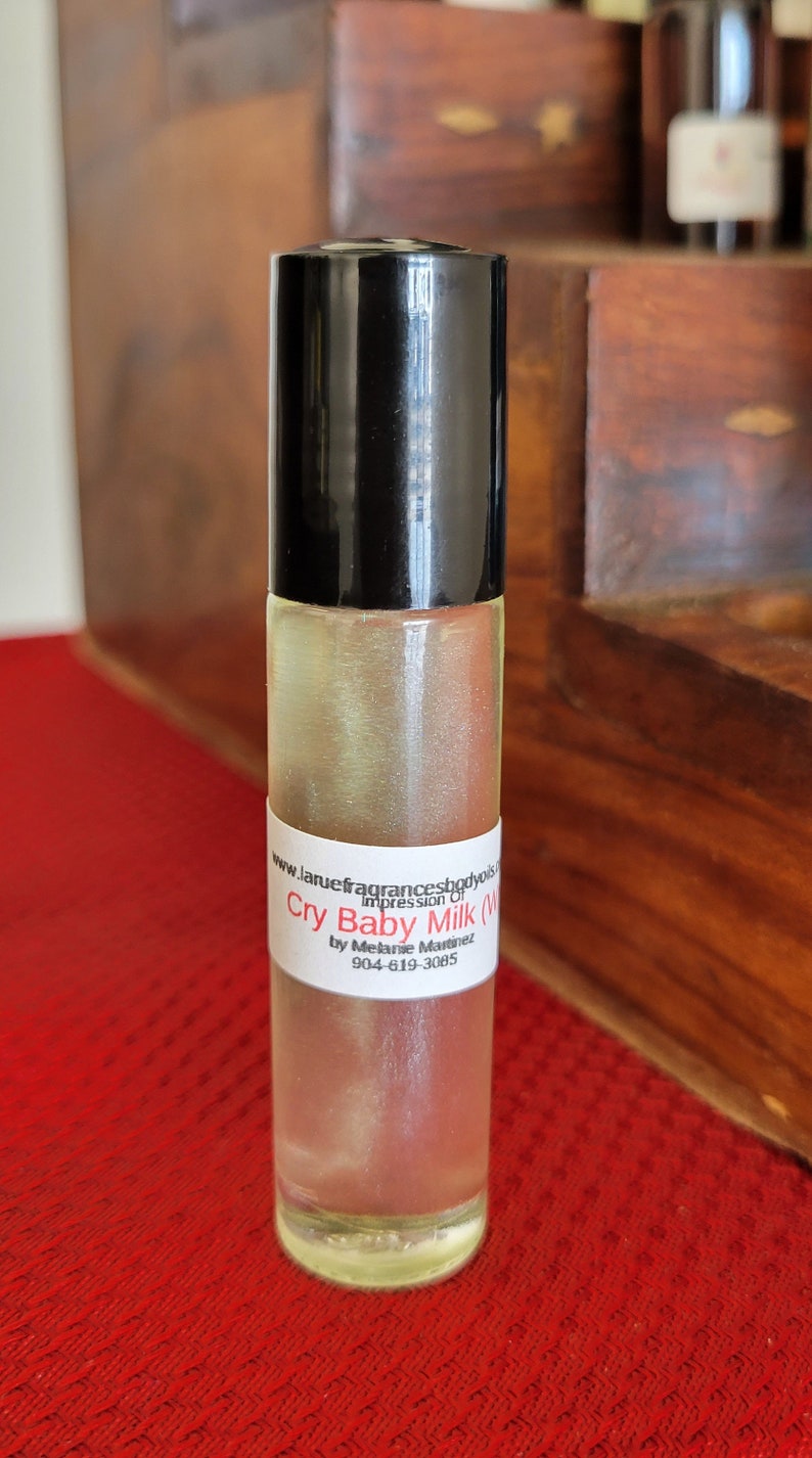 Compare aroma to Cry Baby Milk by Melanie Martinez women type 1/3oz roll-on bottle perfume fragrance body oil.Alcohol-Free image 1