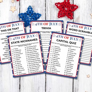 May include: A collection of 4th of July trivia game cards with red, white, and blue borders. The cards feature various quiz formats, including "This or That," "Trivia," "State Nicknames," "Capital Quiz," and "Word Scramble." Decorative star accents are scattered around.