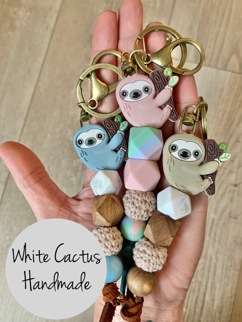 Sloth keychain| sloth charm| sloth bead| sloth backpack tassel| baby sloth| sloth theme favors| bogg bag charm bogg bit| sloth bead| sloth 