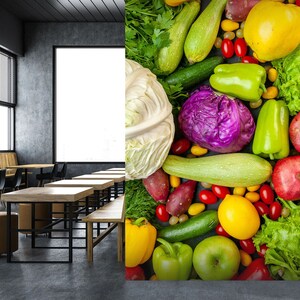 May include: A vibrant display of fresh produce, including green zucchini, bell peppers, red cabbage, and pomegranates. Other items include a white cabbage, sweet potatoes, tomatoes, and a lemon. The arrangement is set against a dark background.