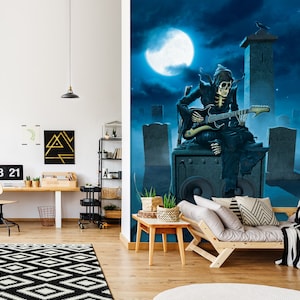 May include: A skeletal figure in a hooded robe sits on a large speaker, playing an electric guitar in a graveyard setting. The moon is full and the sky is dark blue. The tombstones are inscribed with the names "J. HENDRIX", "B. MARLEY", and "K. CORGAN".
