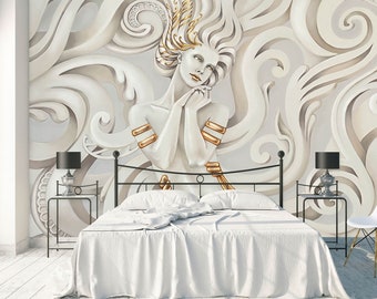 May include: A bedroom with a white bed, nightstands, and a black metal bed frame. The focal point is a large wall mural featuring a white relief sculpture of a woman with gold accents and flowing hair, surrounded by swirling patterns.