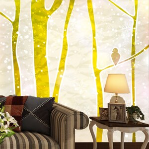 May include: A cozy living room scene featuring a striped sofa with decorative pillows and a side table. The backdrop is a stylized forest with yellow trees and a bird silhouette. A lamp and framed photos add to the warm ambiance.