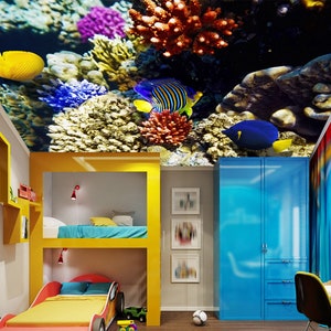 May include: A child's bedroom with a bunk bed and a blue closet. The ceiling is decorated with a colorful mural of coral reefs and fish.