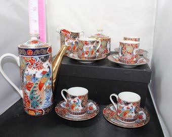 Homecoming Peacock Japanese Imari Porcelain tea set-  5 cups and saucers, teapot w/lid, creamer sugar dish with lid.