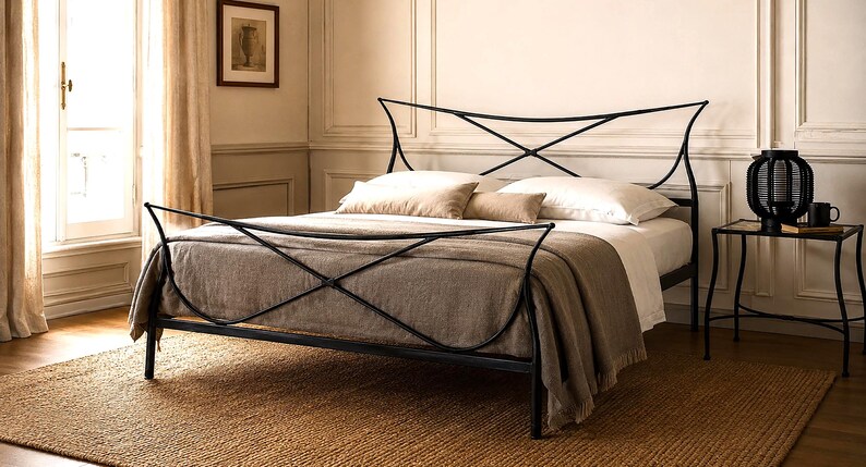 May include: A black metal bed frame with an X-shaped design on the headboard and footboard. The bed is made up with white sheets, pillows, and a brown blanket. A woven rug is on the floor.