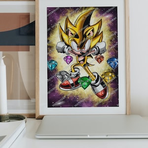 May include: Framed artwork featuring a vibrant illustration of a golden, spiky-haired character with red shoes and white gloves, surrounded by colorful gems. The background is a cosmic blend of purple, yellow, and white. The artwork is displayed on a white surface.