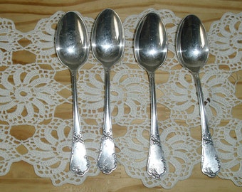 batch of 4 small silver spoons
