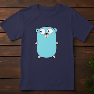 May include: A navy blue t-shirt with a cartoon image of the Go gopher mascot. The gopher is light blue with a white belly and has a friendly expression.