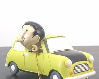 非常に希少！高品質のポリレジン製の、緑色の車を運転するヴィンテージ