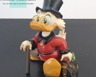 Extremely rare! Vintage Scrooge McDuck with a suitcase full of money statue. Designed by Stefan Toth in the 1980's. Only one in stock!