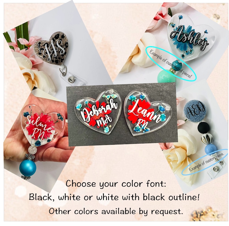 May include: A collection of personalized heart-shaped badge reels and a round badge reel. The heart-shaped reels feature names and floral designs in various colors. The text on the image reads, "Choose your color font: Black, white or white with black outline! Other colors available by request."