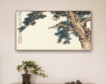 May include: A framed painting depicting a stylised pine tree against a white background. The tree is painted in shades of green and brown. The painting is hanging on a white wall above a wooden entertainment unit.