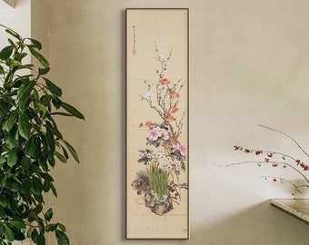 May include: A vertical painting of a floral arrangement with pink, white, and yellow flowers on a beige background. The painting is framed in a thin, brown frame.